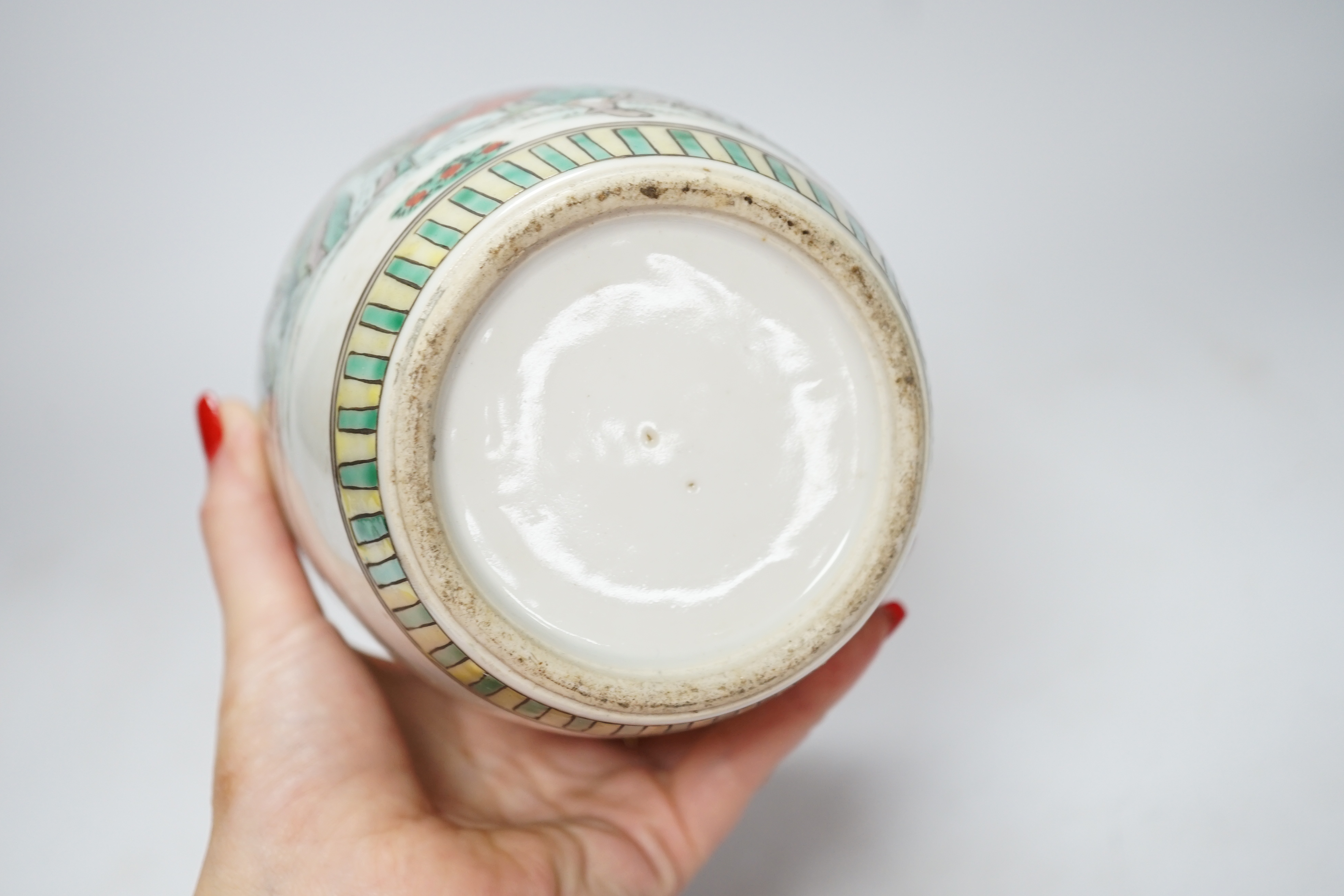 An early 20th century Chinese 'Zhongkui' famille verte jar and cover, 23cm high
